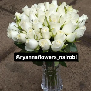 WHITE ROSES WITH A VASE